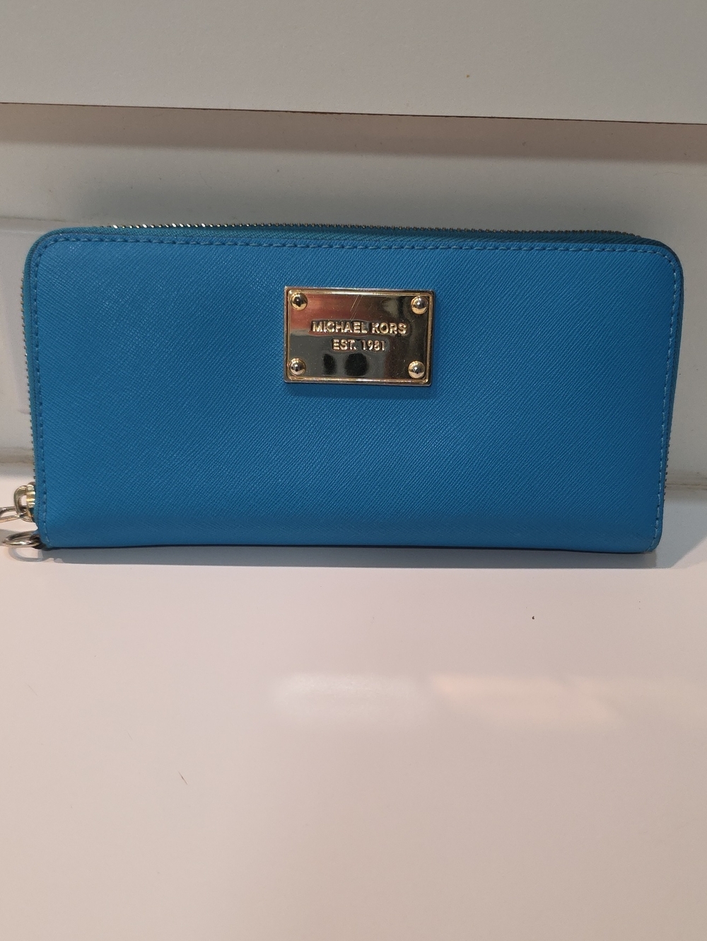 Michael Kors Bright Blue Saffiano Zip Wallet with Gold Plaque